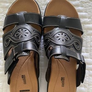 Clarks black slip on sandals